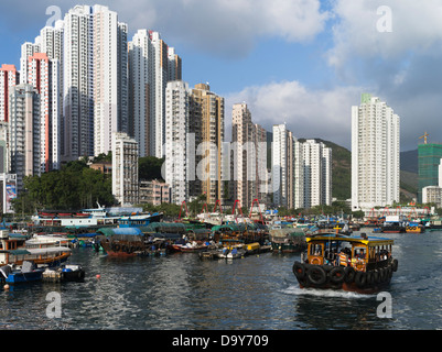 dh Aberdeen Harbour ABERDEEN HONG KONG Ap Lei Chau ferry sampan high rise residential skyscraper flats Stock Photo