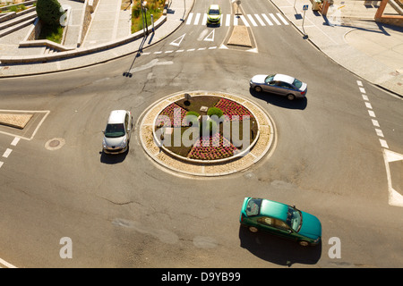 Cars in a roundabout in a high view Stock Photo
