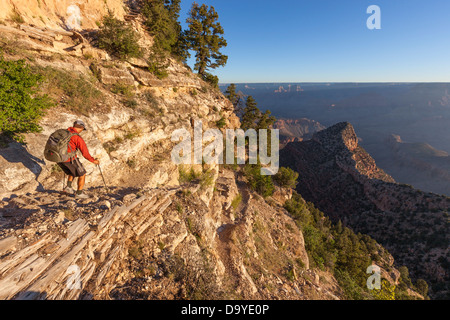 A man hiking on a trail. Stock Photo