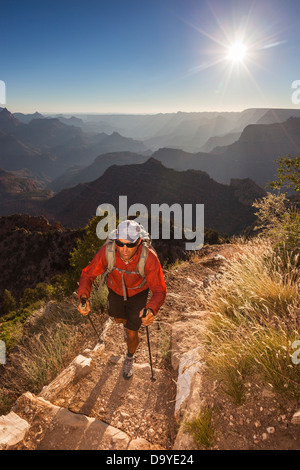 A man hiking on a trail. Stock Photo