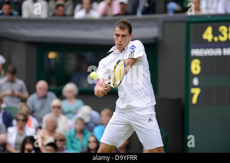 Wimbledon, London, UK. 28th June 2013. The Wimbledon Tennis Championships 2013 held at The All England Lawn Tennis and Croquet Club, London, England, UK.    Jerzy Janowicz  (POL) [24] (pink bandage on right arm) def. Nicolas Almagro  (ESP) [15] Credit:  Duncan Grove/Alamy Live News Stock Photo