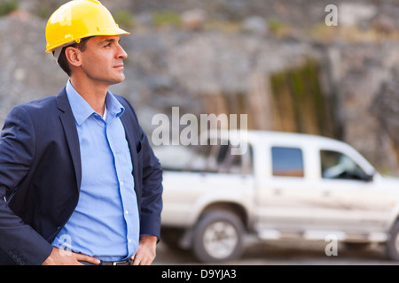 handsome determined mine manager visit mining site Stock Photo