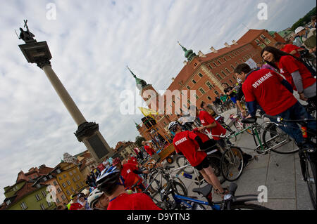 Warsaw, Poland - June 28th, 2013 - Hundreds of bicycle fans gathered on the Castle Square in the Old Town of Warsaw and lead by the Ambassador of Denmark - Steen Hommel - who even tried to make a speech in Polish, rode a 27-kilometer-route through the town.This was one in a series of similar events in the capital city of Poland. Credit:  Henryk Kotowski/Alamy Live News Stock Photo