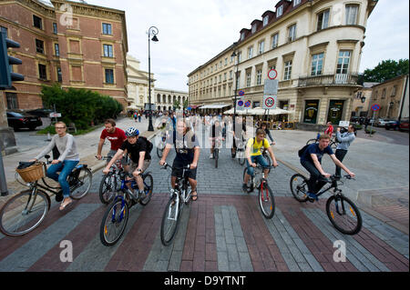 Warsaw, Poland - June 28th, 2013 - Hundreds of bicycle fans gathered on the Castle Square in the Old Town of Warsaw and lead by the Ambassador of Denmark - Steen Hommel - who even tried to make a speech in Polish, rode a 27-kilometer-route through the town.This was one in a series of similar events in the capital city of Poland. Credit:  Henryk Kotowski/Alamy Live News Stock Photo