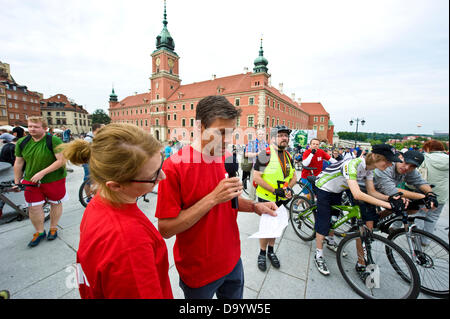 Warsaw, Poland - June 28th, 2013 - Hundreds of bicycle fans gathered on the Castle Square in the Old Town of Warsaw and lead by the Ambassador of Denmark - Steen Hommel - who even tried to make a speech in Polish, rode a 27-kilometer-route through the town.This was one in a series of similar events in the capital city of Poland. Credit:  Henryk Kotowski/Alamy Live News Stock Photo