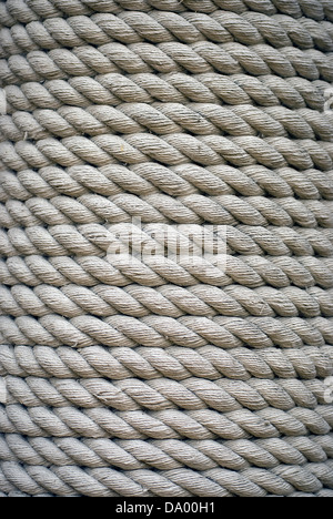 Thick rope wrapped around a pillar Stock Photo