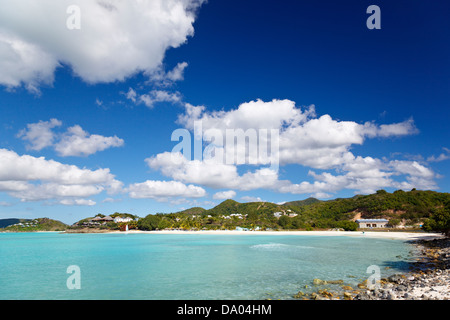 Perfect white caribbean beach with palm trees and turquoise sea. Cocobay Beach, Antigua. Stock Photo