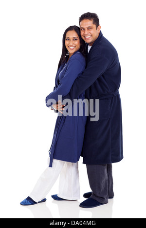 happy indian couple embracing wearing nightgowns isolated on white Stock Photo