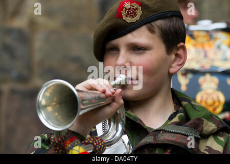 Lancaster, UK 29th June, 2013. Liam Sanders, 13 from Preston, Bugler in the Army Cadet Force, King's Own Royal Border Regiment at the Armed Forces day on parade at Lancaster Castle, Lancashire, UK. Credit:  Conrad Elias/Alamy Live News Stock Photo