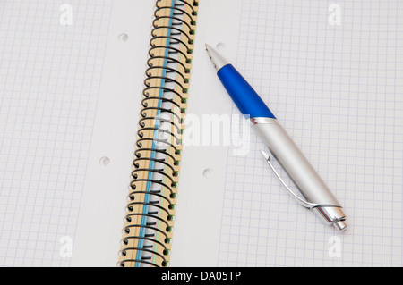 notepad with pen on a white background Stock Photo