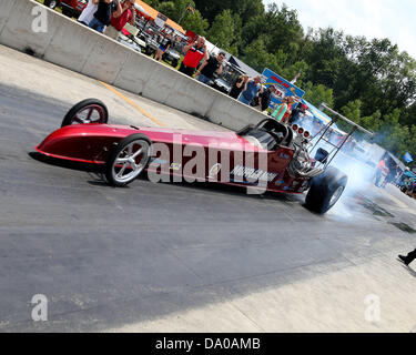 June 29, 2013 - Martin, MI, United States of America - Erin Staley #9X15 (Top Dragster) does a burnout during qualifying at the US 131 Motorsports Park on June 29, 2013 in Martin, Mich. Tom Turrill/CSM Stock Photo