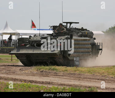 Bovington, UK. 29th June, 2013. The Challenger Armoured Repair and Recovery Vehicle (CRARRV) is an armoured recovery vehicle based on the Challenger 1 hull and designed to repair and recover damaged tanks on the battlefield. It has five seats but usually carries a crew of three soldiers from the Royal Electrical And Mechanical Engineers (REME), of the Vehicle Mechanic and Recovery Mechanic trades. There is room in the cabin for two further passengers (e.g. crew members of the casualty vehicle) on a temporary basis. Stock Photo