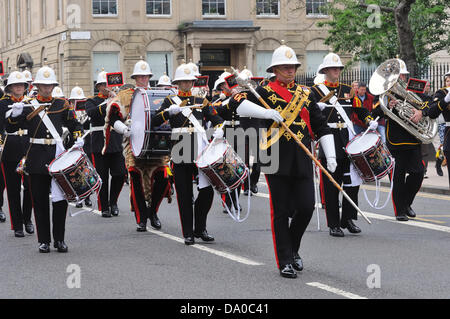 Glasgow, UK. 29th June, 2013. Armed forces day. Members of the armed forces parade through Blythswood Square in Glasgow city centre.