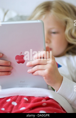 Young girl using an iPad mini