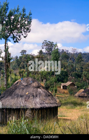 Dwellings photographed along the highway leading from Goroka to Mt. Hagen, Papua New Guinea. Stock Photo