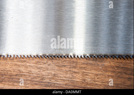 Teeth on a Timber Hand Saw Stock Photo