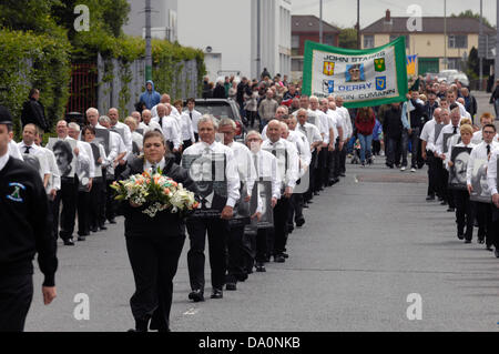 Derry, Northern Ireland. 30th June, 2013. Hundreds of former Irish republican prisoners attend the annual Derry Republican Graves Association commemoration for IRA members who were killed during the Northern Ireland conflict. Credit: George Sweeney / Alamy Live News. Stock Photo