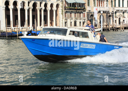 Venetian police boat, Grand Canal, Venice Stock Photo