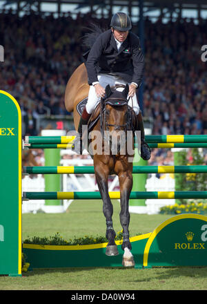 British show jumper Nick Skelton on his horse Big Star in action during the Showjumping Grand Prix at the International Horse Show CHIO in Aachen, Germany, 30 June 2013. Photo: UWE ANSPACH Stock Photo