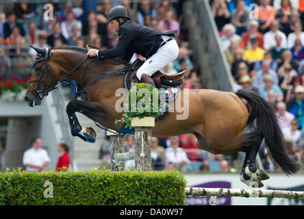 British show jumper Nick Skelton on his horse Big Star in action during the Showjumping Grand Prix at the International Horse Show CHIO in Aachen, Germany, 30 June 2013. Photo: UWE ANSPACH Stock Photo