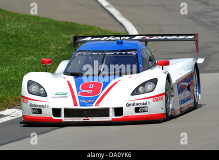 June 30, 2013 - Watkins Glen, New York, USA - June 30, 2013: The Action Express Racing Corvette (9) driven by Brian Frisselle and Burt Frisselle during the GRAND-AM Rolex Series Sahlen's Six Hours of The Glen at Watkins Glen International in Watkins Glen, New York. Stock Photo