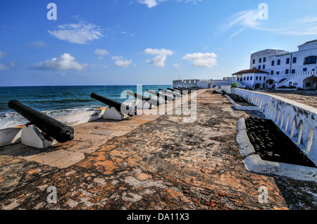 Cannons overlooking from Cape Coast Castle. Cape Coast Castle is a fortification in Ghana built by Swedish traders for trade. Stock Photo