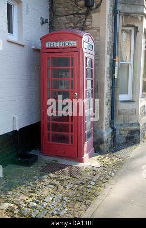 Red telephone box in the Market Square, Faringdon, Oxfordshire Stock Photo