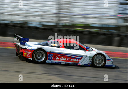 Watkins Glen, New York, USA. 30th June 2013. The Action Express Racing Corvette (5) driven by Joao Barbosa and Christian Fittpaldi during the GRAND-AM Rolex Series Sahlen's Six Hours of The Glen at Watkins Glen International in Watkins Glen, New York. Credit:  Cal Sport Media/Alamy Live News Stock Photo