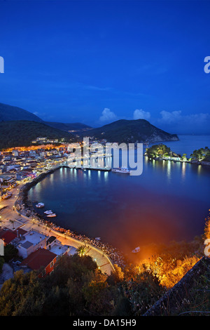 Panoramic night view of Parga town and the islet of Panagia from the Venetian castle of the town, Epirus, Greece. Stock Photo