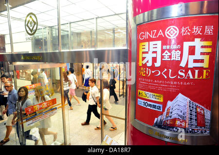 June 30th, 2013 : Tokyo, Japan - Customers came out from Matsuzakaya Ginza, the first department store since 1924 in Ginza, Chuo, Tokyo, Japan, that had a closing sale for rebuilding on June 30, 2013. A lot of people visited for the very last day. (Photo by Koichiro Suzuki/AFLO) Stock Photo