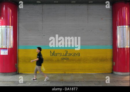 June 30th, 2013 : Tokyo, Japan - A man walked by Matsuzakaya Ginza, the first department store since 1924 in Ginza, Chuo, Tokyo, Japan, that just closed its 88-year history for rebuilding on June 30, 2013. (Photo by Koichiro Suzuki/AFLO) Stock Photo