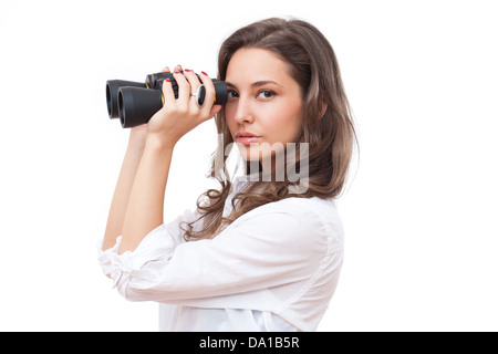 Portrait of fashionable young brunette woman searching employment with binoculars. Stock Photo