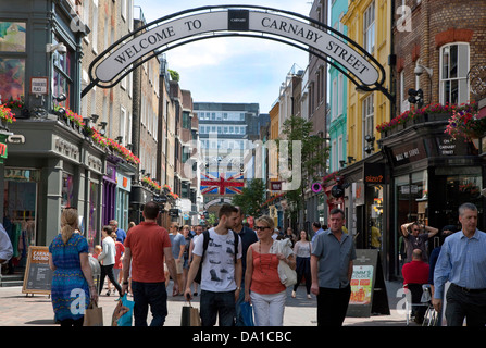 Carnaby Street, London on a busy Sunday afternoon Stock Photo