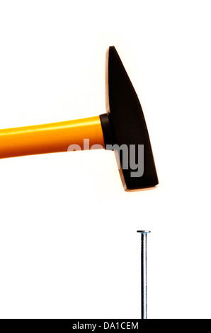 hammer hitting a nail Stock Photo