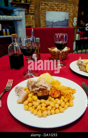 Cocido madrileño serving in a typical tavern. Madrid, Spain. Stock Photo