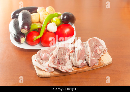 raw lamb meat with fresh vegetables Stock Photo