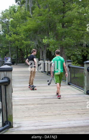 Teens Skateboarding Stock Photo