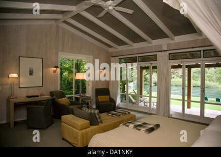 Taupo a bedroom suite of the Huka Lodge luxury accommodation Stock ...