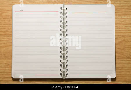 Open Spiral Notepad on the table Stock Photo