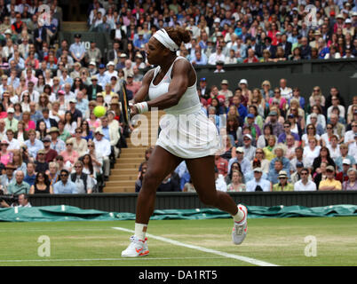 Wimbledon, London, UK. 1st July 2013. Day Seven of the The Wimbledon Tennis Championships 2013 held at The All England Lawn Tennis and Croquet Club, London, England, UK. Sabine Lisicki ( GER ) against Serena Williams ( USA ) Lisicki, the 23rd seed, won the fourth-round encounter 6-2 1-6 6-4 on Centre Court. Credit:  Action Plus Sports Images/Alamy Live News Stock Photo