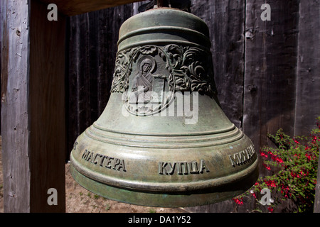 Bell with Cyrillic writing outside of Holy Trinity St. Nicholas Chapel, Fort Ross State Historic Park, Sonoma County, California, United States of America Stock Photo