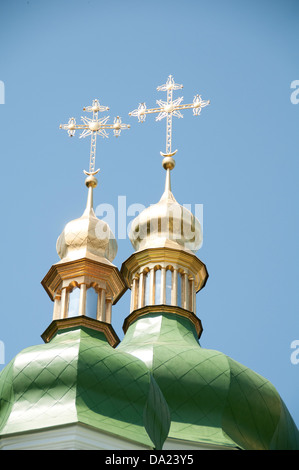 Gold crosses on the green domes. Stock Photo