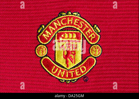 The Manchester United Football Club badge as seen on a playing jersey (Editorial use only).
