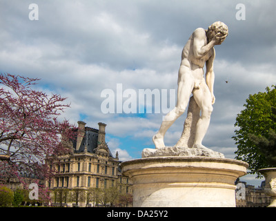 Cain with head in hands after killing his brother Jardin des Tuileries, Paris Stock Photo