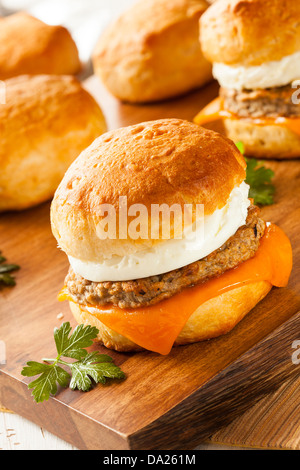 Homemade Egg Sandwich with Sausage and Cheese on a Roll Stock Photo