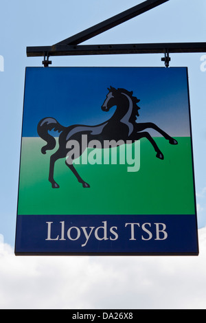 UK high street banking group Lloyds TSB sign above bank with iconic black prancing horse. Stock Photo