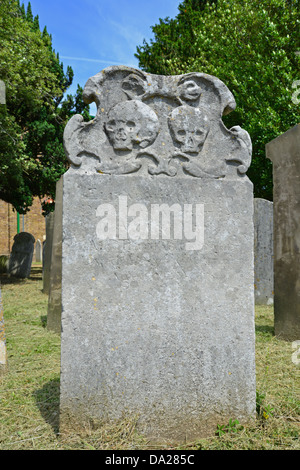 Ancient headstones with sculls, St Mary's Anglican Church, Church Street, Sunbury-on-Thames, Surrey, England, United Kingdom Stock Photo