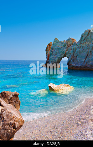 Lalaria beach and the famous holey rock at Skiathos island in Greece Stock Photo