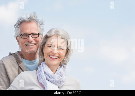 Portrait of senior smiling outdoors Stock Photo