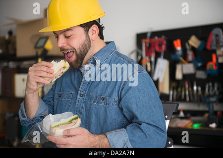 Portrait of manual worker taking break Stock Photo